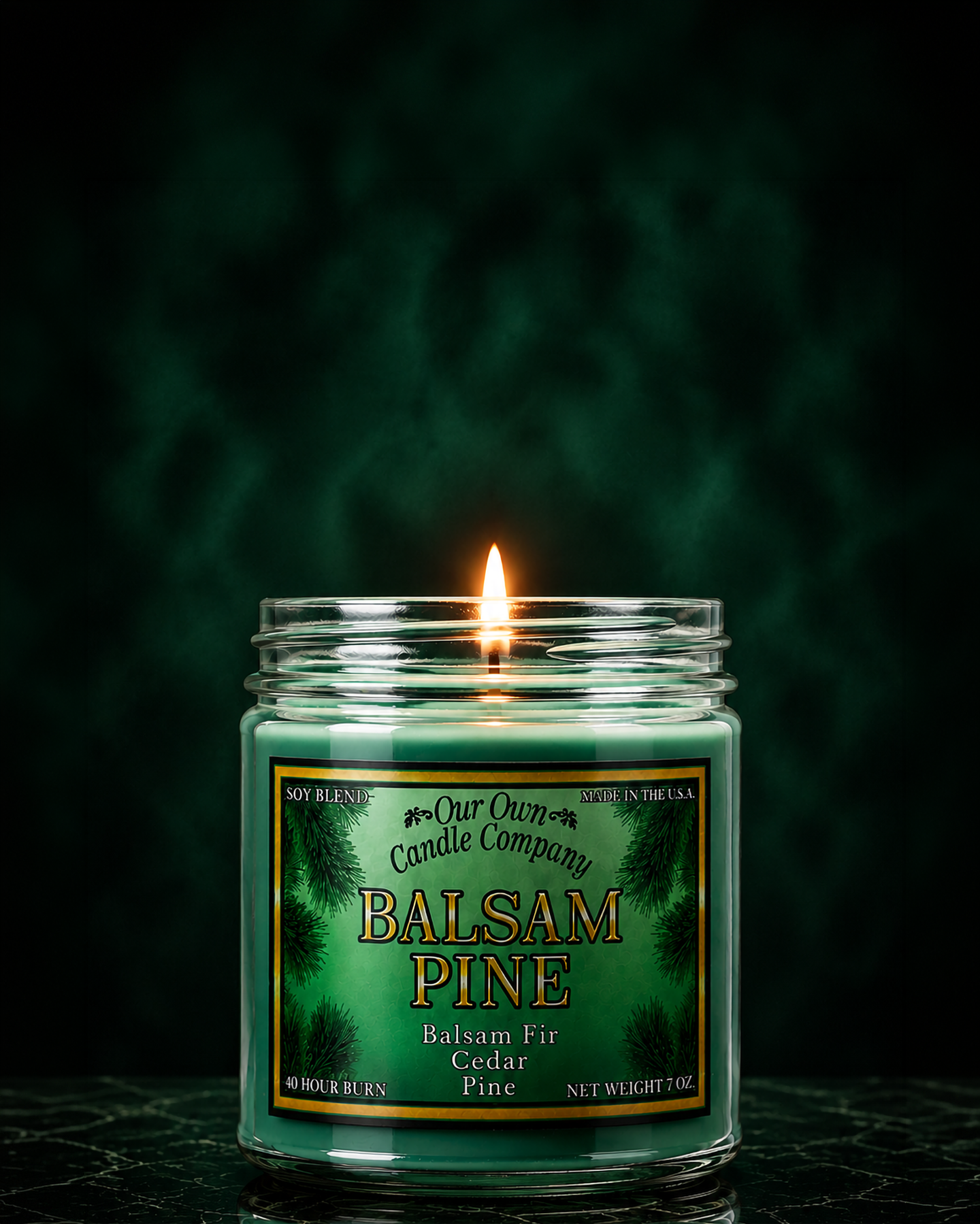 Lit Balsam Pine Gold Series candle